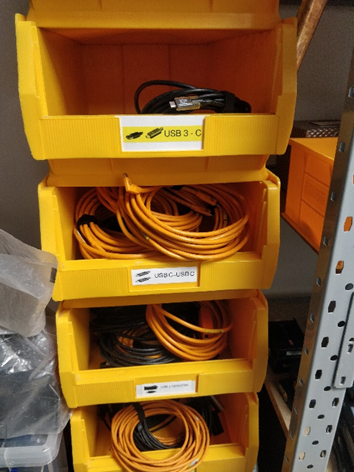 A yellow bin with wires in it

Description automatically generated with low confidence